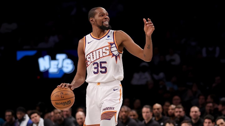 Jan 31, 2024; Brooklyn, New York, USA; Phoenix Suns forward Kevin Durant (35) controls the ball against the Brooklyn Nets during the second quarter at Barclays Center. Mandatory Credit: Brad Penner-Imagn Images
