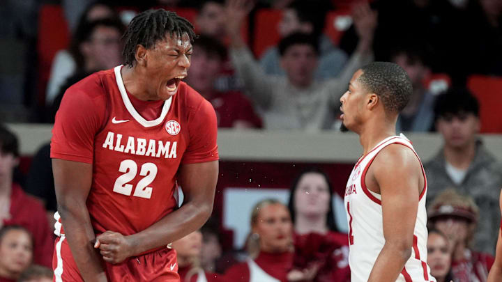 Alabama forward Aiden Sherrell (22) celebrates next to Oklahoma guard Xzayvier Brown (1) and Alabama guard Houston Mallette (95) in the second half of the men's college basketball game between the University of Oklahoma Sooners and the Alabama Crimson Tide, Saturday,Jan. 17, 2026.