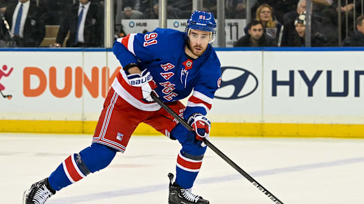 Jan 23, 2025; New York, New York, USA;  New York Rangers right wing Reilly Smith (91) looks for a pass against the Philadelphia Flyers during the first period at Madison Square Garden. Mandatory Credit: Dennis Schneidler-Imagn Images