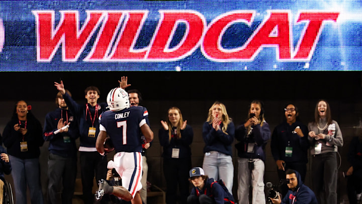 Nov 15, 2024; Tucson, Arizona, USA; Arizona Wildcats running back Quali Conley (7) runs to the end zone to score a touchdown during the third quarter against the Houston Cougars at Arizona Stadium. Mandatory Credit: Aryanna Frank-Imagn Images