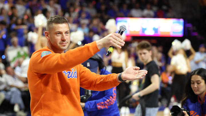 New Gator head football coach Jon Sumrall fires up the crowd during the first half an NCAA basketball game at Steven C. O'Connell Center Exactek arena in Gainesville, FL on Saturday, January 24, 2026. Students, who get in free, have a limited number of seats so many camp out overnight. [Alan Youngblood/Gainesville Sun]
