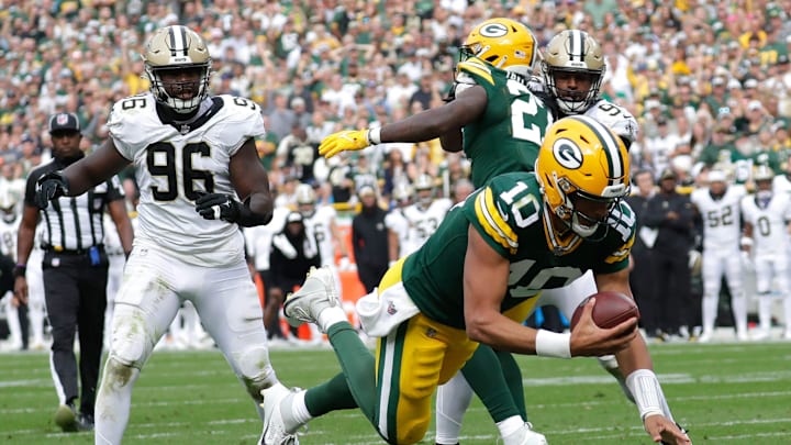Wisconsin, USA; Green Bay Packers quarterback Jordan Love (10) dives for a touchdown against the New Orleans Saints in the fourth quarter during the second half on September 24, 2023, at Lambeau Field in Green Bay.