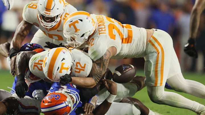 Florida quarterback DJ Lagway (2) gets sacked Tennessee defensive lineman Tyre West (42) and coughs up the ball during the second half of an NCAA football game against Tennessee at Steve Spurrier Field at Ben Hill Griffin Stadium in Gainesville, FL on Saturday, November 22, 2025. Florida lost to Tennessee 31-11[Alan Youngblood/Gainesville Sun]