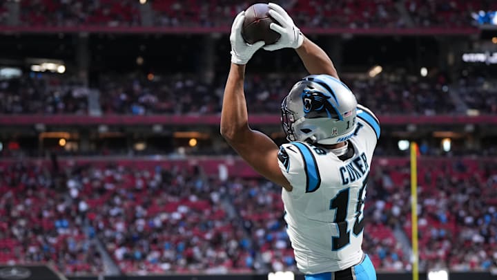 Nov 16, 2025; Atlanta, Georgia, USA; Carolina Panthers wide receiver Jalen Coker (18) makes a catch for a two point conversion in the fourth quarter against the Atlanta Falcons at Mercedes-Benz Stadium.