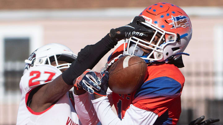 Millville's Lotzeir Brooks, right, sets the record for South Jersey career receiving touchdown