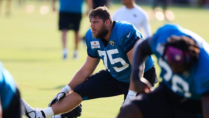 Jacksonville Jaguars guard Cooper Hodges (75) stretches Tuesday, Aug. 1, 2023 at Miller Electric Center at EverBank Stadium in Jacksonville, Fla. Today marked the first padded practice. Jacksonville Jaguars guard Cooper Hodges (75) stretches Tuesday, Aug. 1, 2023 at Miller Electric Center at EverBank Stadium in Jacksonville, Fla. Today marked the first padded practice.