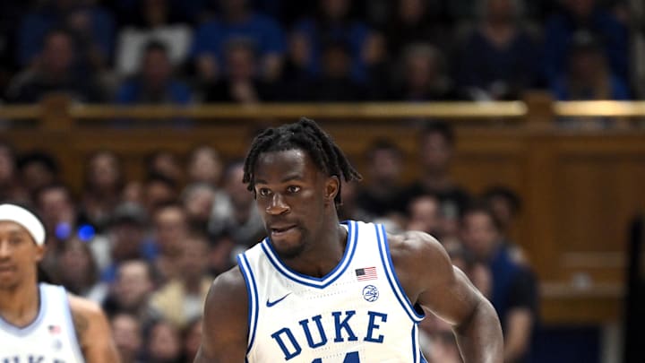 Nov 16, 2024; Durham, North Carolina, USA; Duke Blue Devils guard Sion James (14) brings the ball down court during the second half against the Wofford Terriers at Cameron Indoor Stadium. Mandatory Credit: Zachary Taft-Imagn Images