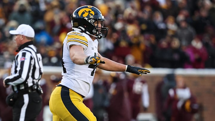 Nov 19, 2022; Minneapolis, Minnesota, USA; Iowa Hawkeyes linebacker Seth Benson (44) reacts to a