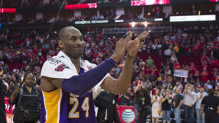 Apr 10, 2016; Houston, TX, USA; Los Angeles Lakers forward Kobe Bryant (24) waves to the Houston Rockets crowd as he leaves the game at the Toyota Center. The Rockets defeat the Lakers 130-110. Mandatory Credit: Jerome Miron-Imagn Images