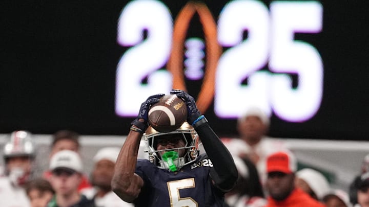Jan 20, 2025; Atlanta, GA, USA; Notre Dame Fighting Irish wide receiver Beaux Collins (5) catches a pass against the Ohio State Buckeyes in the second half in the CFP National Championship college football game at Mercedes-Benz Stadium. Mandatory Credit: Dale Zanine-Imagn Images