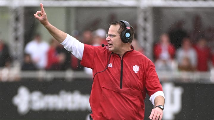 Sep 28, 2024; Bloomington, Indiana, USA;  Indiana Hoosiers head coach Curt Cignetti signals to his team during the second half against the Maryland Terrapins at Memorial Stadium. Mandatory Credit: Robert Goddin-Imagn Images