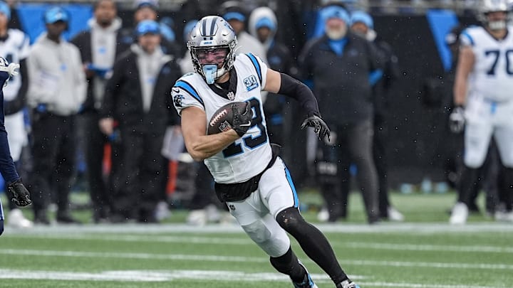 Dec 15, 2024; Charlotte, North Carolina, USA; Carolina Panthers wide receiver Adam Thielen (19) runs after a catch during the second half against the Dallas Cowboys at Bank of America Stadium. Mandatory Credit: Jim Dedmon-Imagn Images