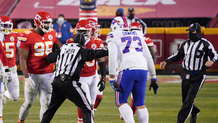 Jan 24, 2021; Kansas City, MO, USA; Buffalo Bills offensive tackle Dion Dawkins (73) is separated from Kansas City Chiefs defensive tackle Chris Jones (95) by the officials during the fourth quarter in the AFC Championship Game at Arrowhead Stadium. Mandatory Credit: Denny Medley-Imagn Images