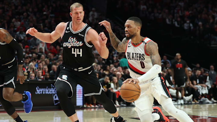 Mar 19, 2023; Portland, Oregon, USA; Portland Trail Blazers guard Damian Lillard (0) drives the lane past LA Clippers center Mason Plumlee (44) in the second half at Moda Center. Mandatory Credit: Jaime Valdez-Imagn Images Mar 19, 2023; Portland, Oregon, USA; Portland Trail Blazers guard Damian Lillard (0) drives the lane past LA Clippers center Mason Plumlee (44) in the second half at Moda Center. Mandatory Credit: Jaime Valdez-Imagn Images