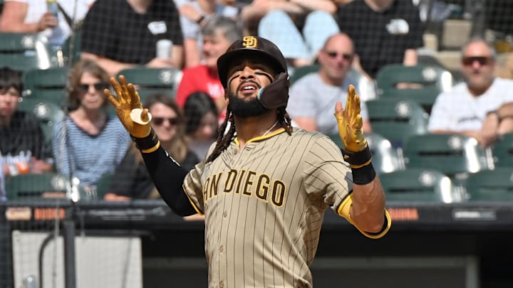 Sep 21, 2025; Chicago, Illinois, USA; San Diego Padres right fielder Fernando Tatis Jr. (23) celebrates his solo home run against the Chicago White Sox during the third inning at Rate Field. Mandatory Credit: Patrick Gorski-Imagn Images