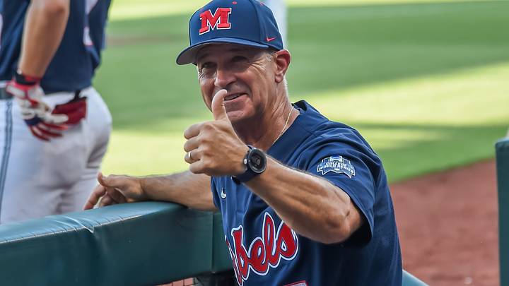 Ole Miss Rebels head coach Mike Bianco greets a fan before the game. Ole Miss Rebels head coach Mike Bianco greets a fan before the game.