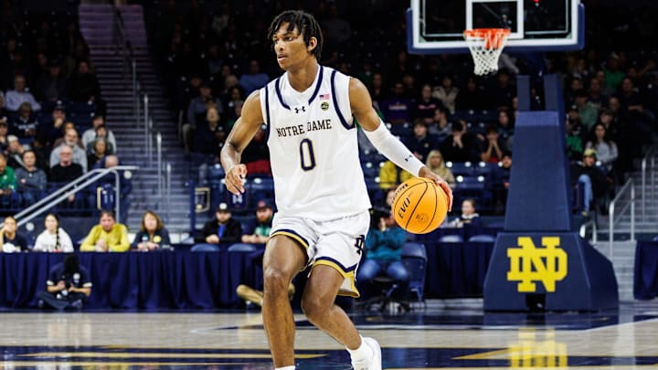 Notre Dame forward Carey Booth (0) drives to the lane during the Maryland Eastern Shore-Notre Dame