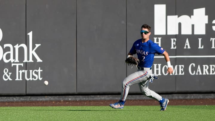 Kansas' center fielder Mike Koszewski (2) runs to the ball against Texas Tech in game two of their Big 12 baseball series, Friday, May 19, 2023, at Dan Law Field at Rip Griffin Park.