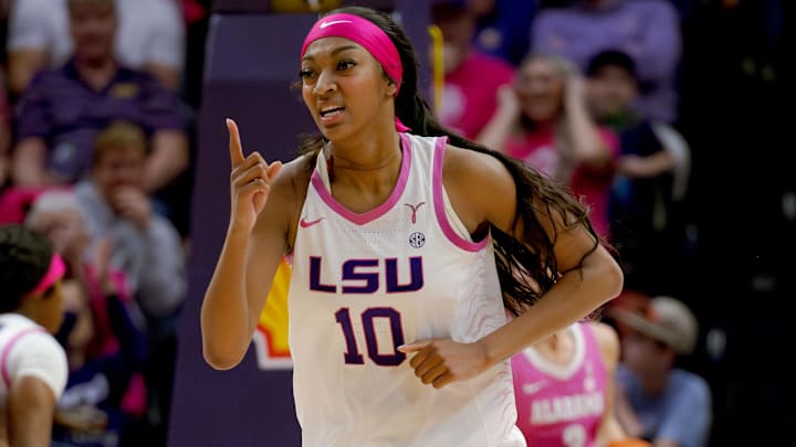 Feb 11, 2024; Baton Rouge, Louisiana, USA; LSU Lady Tigers forward Angel Reese (10) celebrates a