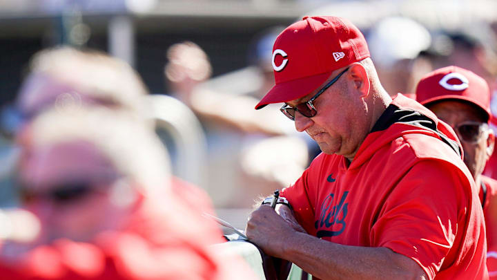 Cincinnati Reds manager Terry Francona takes notes during a Cactus League game between the Cincinnati Reds and San Francisco Giants, Sunday, Feb. 23, 2025, at Scottsdale Stadium in Scottsdale, Ariz.