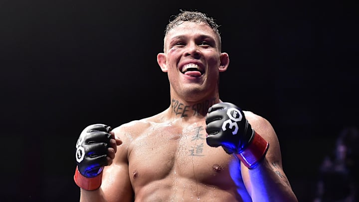 Nov 4, 2023; Sao Paulo, Brazil; Caio Borralho (red gloves) reacts after defeating  Abus Magomedov