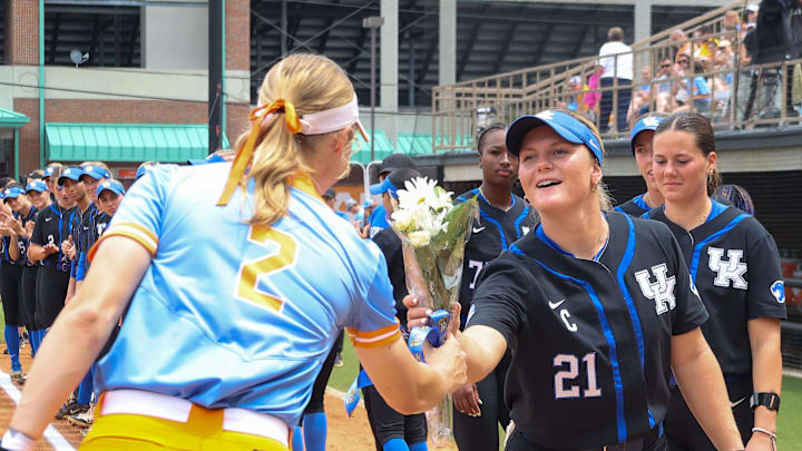 Tennessee softball seniors give Kentucky seniors flowers before the game against Kentucky at Sherri Parker Lee Stadium in Knoxville, TN on May 4, 2024.