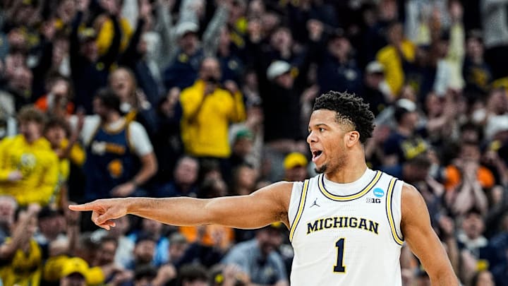 Michigan guard Trey McKenney (1) celebrates a 3-pointer against Tennessee during the first half of NCAA Tournament Elite 8 round at United Center in Chicago on Sunday, March 29, 2026. Michigan guard Trey McKenney (1) celebrates a 3-pointer against Tennessee during the first half of NCAA Tournament Elite 8 round at United Center in Chicago on Sunday, March 29, 2026.