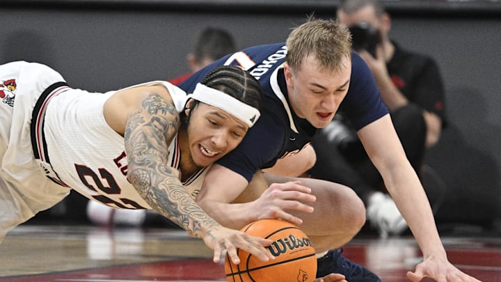 Jan 27, 2024; Louisville, Kentucky, USA;  Louisville Cardinals guard Tre White (22) scrambles for