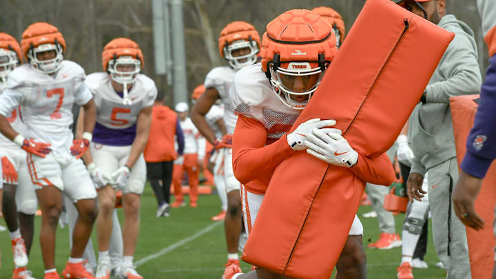 Clemson safety Jakarrion Kenan (20) in a tackle drill during the football practice at the Allen N. Reeves Football Complex at Clemson University in Clemson, S.C. Wednesday, March 5, 2025.