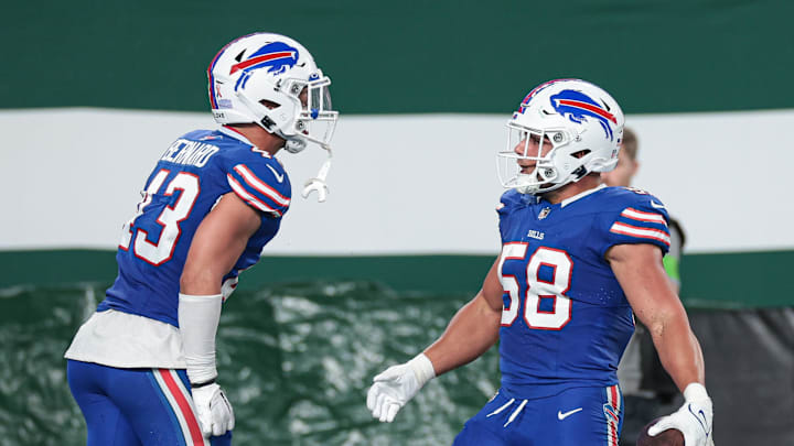 Sep 11, 2023; East Rutherford, New Jersey, USA; Buffalo Bills linebacker Matt Milano (58) reacts after his interception with linebacker Terrel Bernard (43) 