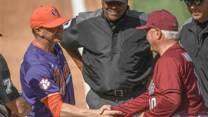 Clemson Head Coach Erik Bakich and South Carolina Head Coach Paul Mainier shake hands before the game between the two state rivals at Fluor Field in Greenville, S.C. Saturday, March 1, 2025.