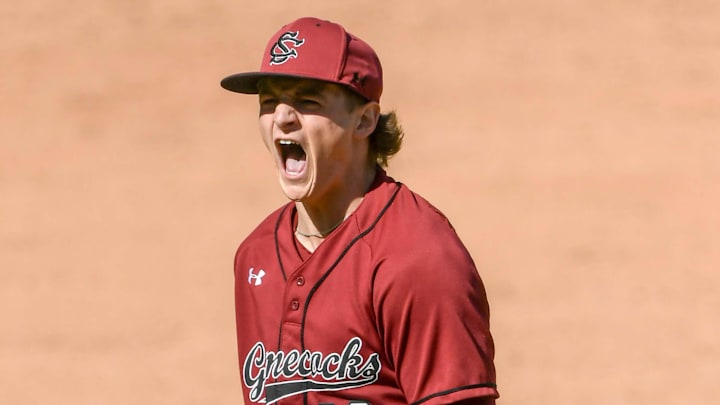 Mar 1, 2025; Greenville, South Carolina, USA; South Carolina Gamecocks pitcher Jake McCoy (23) reacts after striking out a batter against the Clemson Tigers during the top of the fourth inning at Fluor Field. Mandatory Credit: Ken Ruinard/USA Today Network via Imagn Images