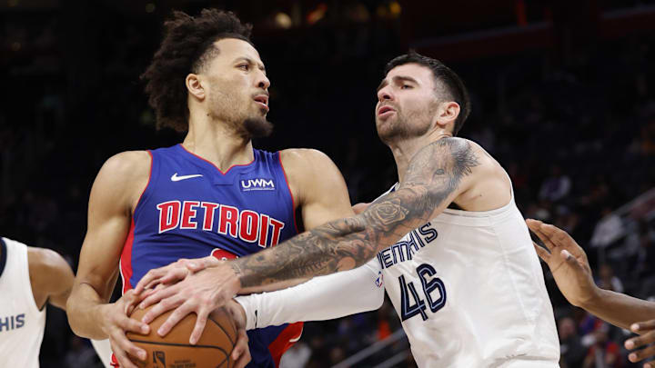 Dec 6, 2023; Detroit, Michigan, USA; Memphis Grizzlies guard John Konchar (46) strips the ball from Dec 6, 2023; Detroit, Michigan, USA; Memphis Grizzlies guard John Konchar (46) strips the ball from
