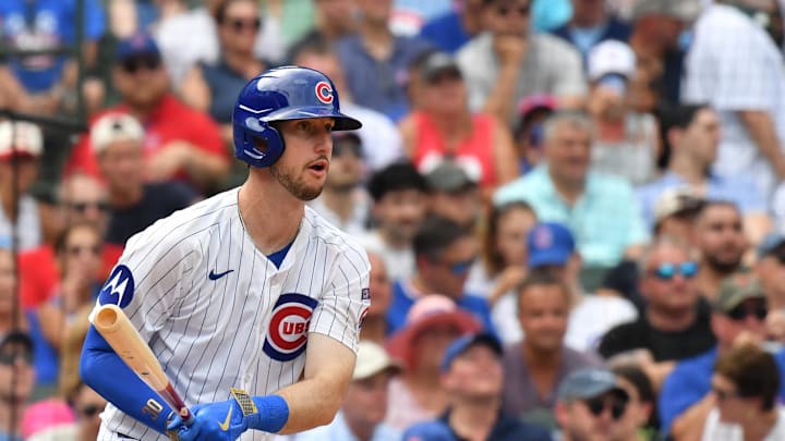 Aug 16, 2025; Chicago, Illinois, USA; Chicago Cubs right fielder Kyle Tucker (30) hits a single during the eighth inning against the Pittsburgh Pirates at Wrigley Field. Mandatory Credit: Patrick Gorski-Imagn Images