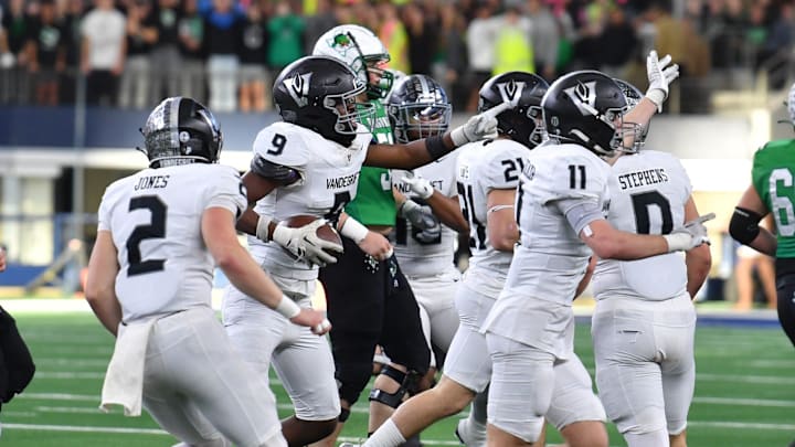 Austin Vandegrift recovers the ball during the 6A DII UIL Texas State Football Championship game against Southlake Carroll on Saturday, December 21, 2024 at AT&T Stadium in Arlington.