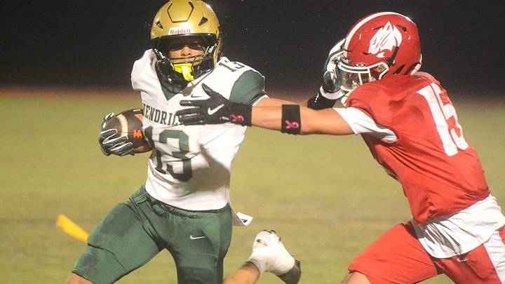 Bishop Hendricken's Javien Valle is pictured here fending off NFA's Remo Iozzia in a game earlier this season. Valle caught a touchdown pass Friday in a 24-13 win over La Salle Academy as the Hawks rejoin the Top 10 in the New England High School Football Regional Rankings as the top-ranked team from Rhode Island. Bishop Hendricken's Javien Valle is pictured here fending off NFA's Remo Iozzia in a game earlier this season. Valle caught a touchdown pass Friday in a 24-13 win over La Salle Academy as the Hawks rejoin the Top 10 in the New England High School Football Regional Rankings as the top-ranked team from Rhode Island.