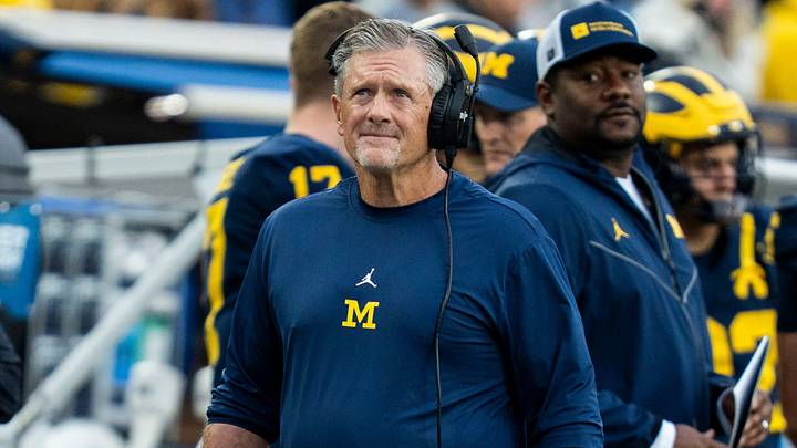 Michigan Wolverines head coach Kyle Whittingham looks at the scoreboard as he walks the sidelines in the second quarter of a game against UTEP at Michigan Stadium in Ann Arbor on Saturday, Sept. 19, 2026. Michigan Wolverines head coach Kyle Whittingham looks at the scoreboard as he walks the sidelines in the second quarter of a game against UTEP at Michigan Stadium in Ann Arbor on Saturday, Sept. 19, 2026.