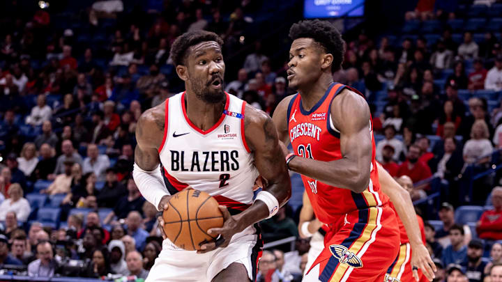 Nov 4, 2024; New Orleans, Louisiana, USA;  Portland Trail Blazers center Deandre Ayton (2) dribbles against New Orleans Pelicans center Yves Missi (21) during the first half at Smoothie King Center. Mandatory Credit: Stephen Lew-Imagn Images