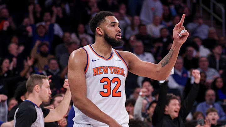 Feb 3, 2025; New York, New York, USA; New York Knicks center Karl-Anthony Towns (32) reacts after basket against the Houston Rockets during the second half at Madison Square Garden. Mandatory Credit: Vincent Carchietta-Imagn Images