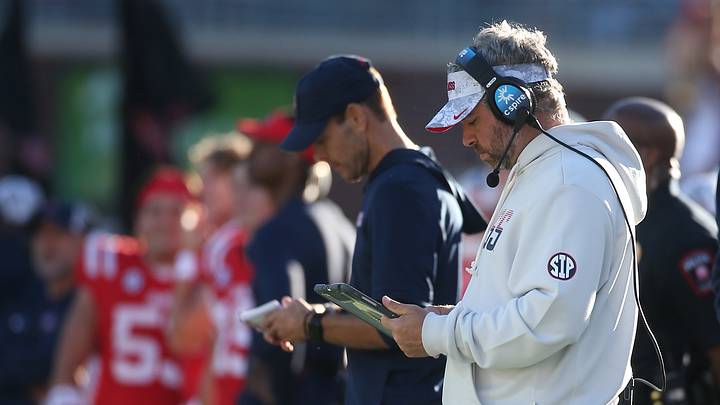Ole Miss HC looks at a tablet during a game against Missouri. Mandatory Credit: Petre Thomas-Imagn Images | IMAGN IMAGES via Reuters Connect Ole Miss HC looks at a tablet during a game against Missouri. Mandatory Credit: Petre Thomas-Imagn Images | IMAGN IMAGES via Reuters Connect