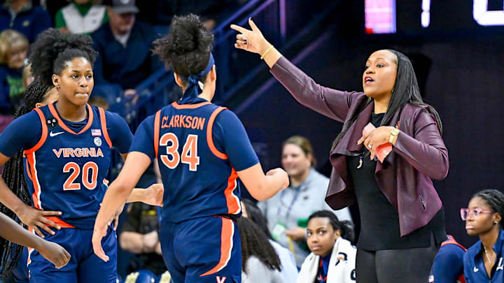 Jan 22, 2023; South Bend, Indiana, USA; Virginia Cavaliers head coach Amaka Agugua-Hamilton talks to her players in the second half against the Notre Dame Fighting Irish at the Purcell Pavilion. Mandatory Credit: Matt Cashore-Imagn Images