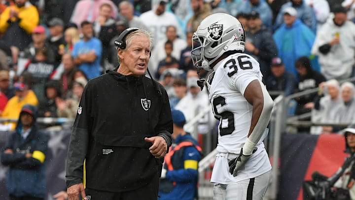 Sep 7, 2025; Foxborough, Massachusetts, USA; Las Vegas Raiders head coach Pete Carroll talks with cornerback Kyu Blu Kelly (36) at Gillette Stadium. Mandatory Credit: Bob DeChiara-Imagn Images