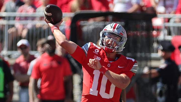Ohio State quarterback Julian Sayin throws a pass against Illinois. Ohio State quarterback Julian Sayin throws a pass against Illinois.