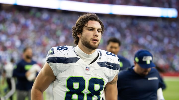 Dec 8, 2024; Glendale, Arizona, USA; Seattle Seahawks tight end AJ Barner (88) against the Arizona Cardinals at State Farm Stadium. 