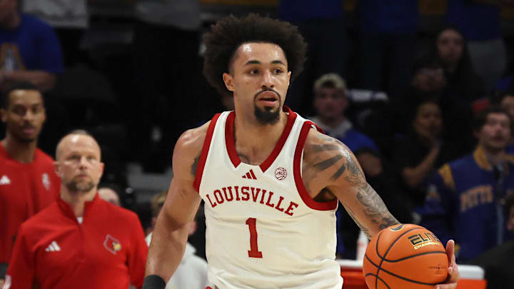 Jan 17, 2026; Pittsburgh, Pennsylvania, USA; Louisville Cardinals guard J'vonne Hadley (1) brings the ball up court against the Pittsburgh Panthers during the first half at the Petersen Events Center. Mandatory Credit: Charles LeClaire-Imagn Images