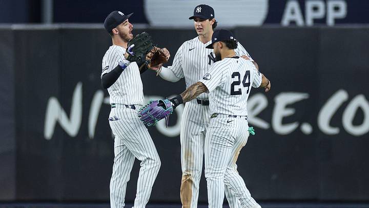 Jun 19, 2026; Bronx, New York, USA; New York Yankees left fielder Cody Bellinger (35) celebrates with right fielder Spencer Jones (78) and designated hitter Jasson Dominguez (24) after defeating the Cincinnati Reds at Yankee Stadium. Mandatory Credit: Vincent Carchietta-Imagn Images