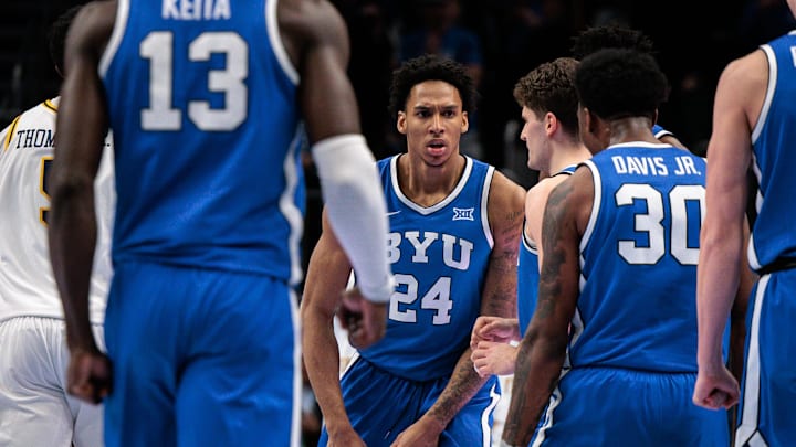 Mar 11, 2026; Kansas City, MO, USA; BYU Cougars forward Dominique Diomande (24) reacts after a play during the first half against the West Virginia Mountaineers at T-Mobile Center. Mandatory Credit: William Purnell-Imagn Images
