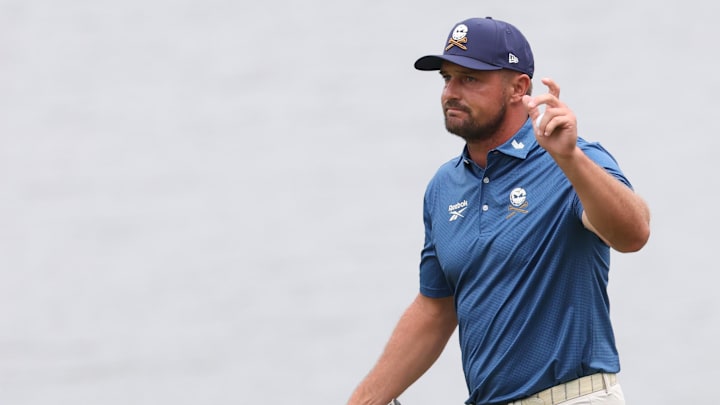 Bryson DeChambeau of team Crushers GC waves to the crowd after completing his round during the final round of the LIV Golf Virginia golf tournament at Robert Trent Jones Golf Club. Bryson DeChambeau of team Crushers GC waves to the crowd after completing his round during the final round of the LIV Golf Virginia golf tournament at Robert Trent Jones Golf Club.
