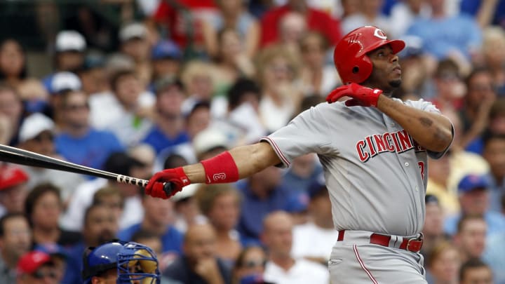 July 10, 2008; Chicago, IL, USA; Cincinnati Reds right fielder Ken Griffey Jr. (3) hits a three run home run during the fourth inning against the Chicago Cubs at Wrigley Field.  Mandatory Credit: Jerry Lai-USA TODAY Sports