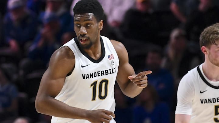 Jan 27, 2026; Nashville, Tennessee, USA;  Vanderbilt Commodores forward Ak Okereke (10) reacts after a made three point basket against the Kentucky Wildcats during the first half at Memorial Gymnasium. Mandatory Credit: Steve Roberts-Imagn Images